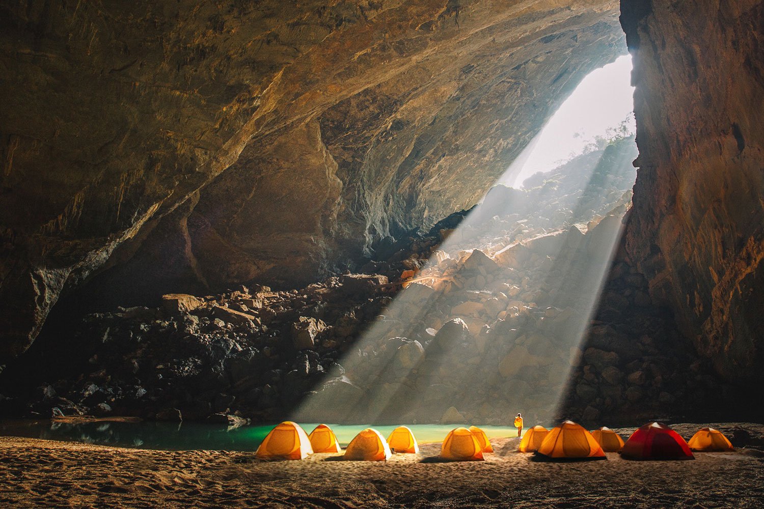 Sunbeams will shine deep into the cave campsite in the morning.