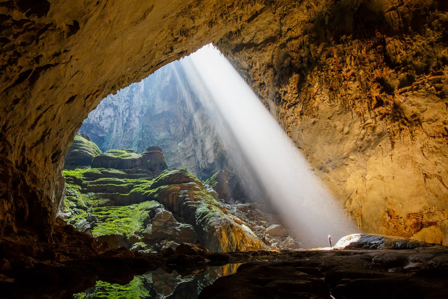 Impressive sunbeams from Doline 1 of Son Doong Cave