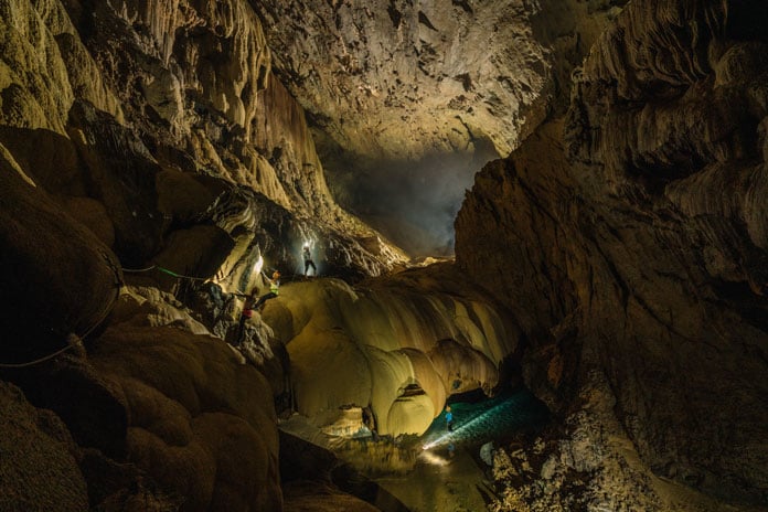 Traverse to the high-level passage in Hang Va Cave