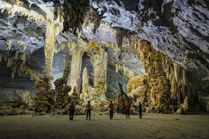 Plenty of stalactites and stalagmites can be seen in Tu Lan Cave.