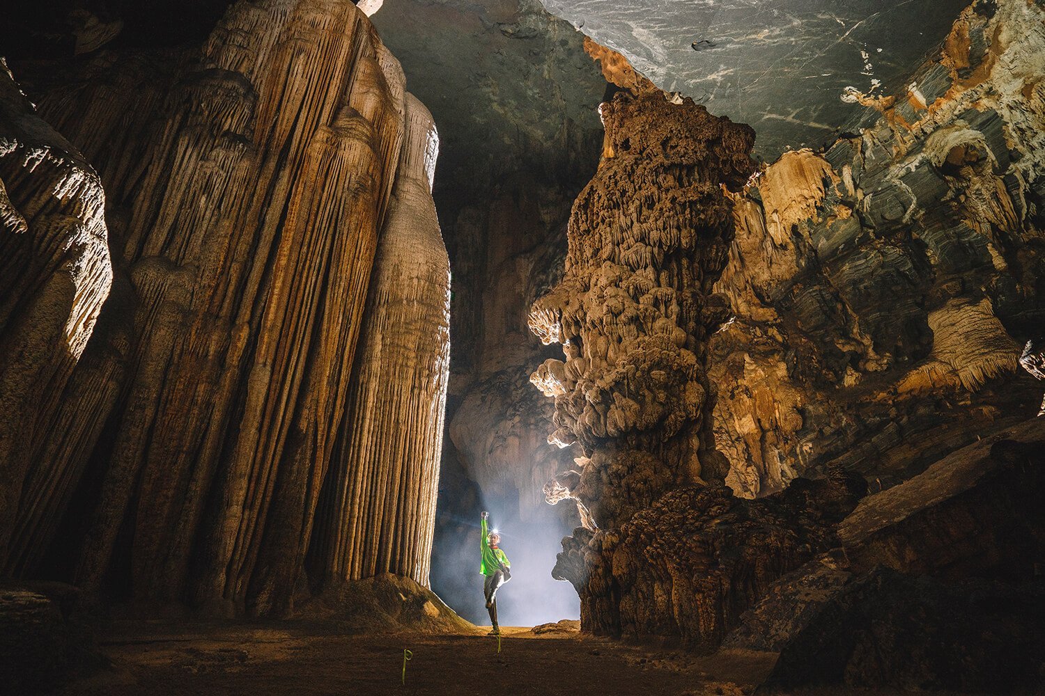 Giant stalactite columns inside Hang Tien 2.