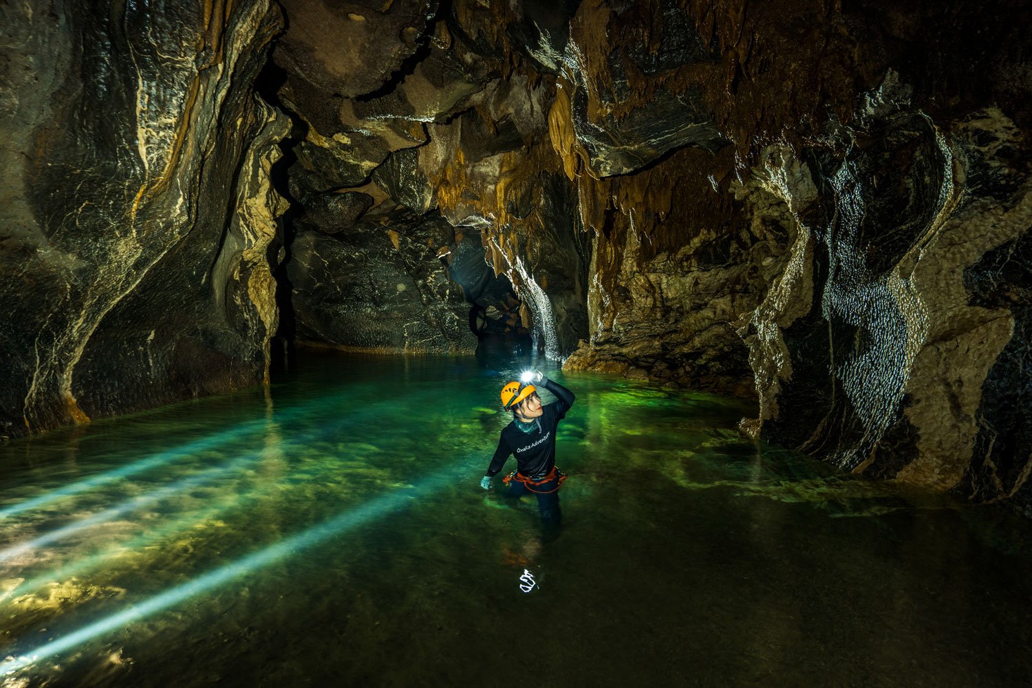 A beautiful emerald underground river inside Hang Va is very cool and refreshing, allowing guests to swim and cool off during the summer season.