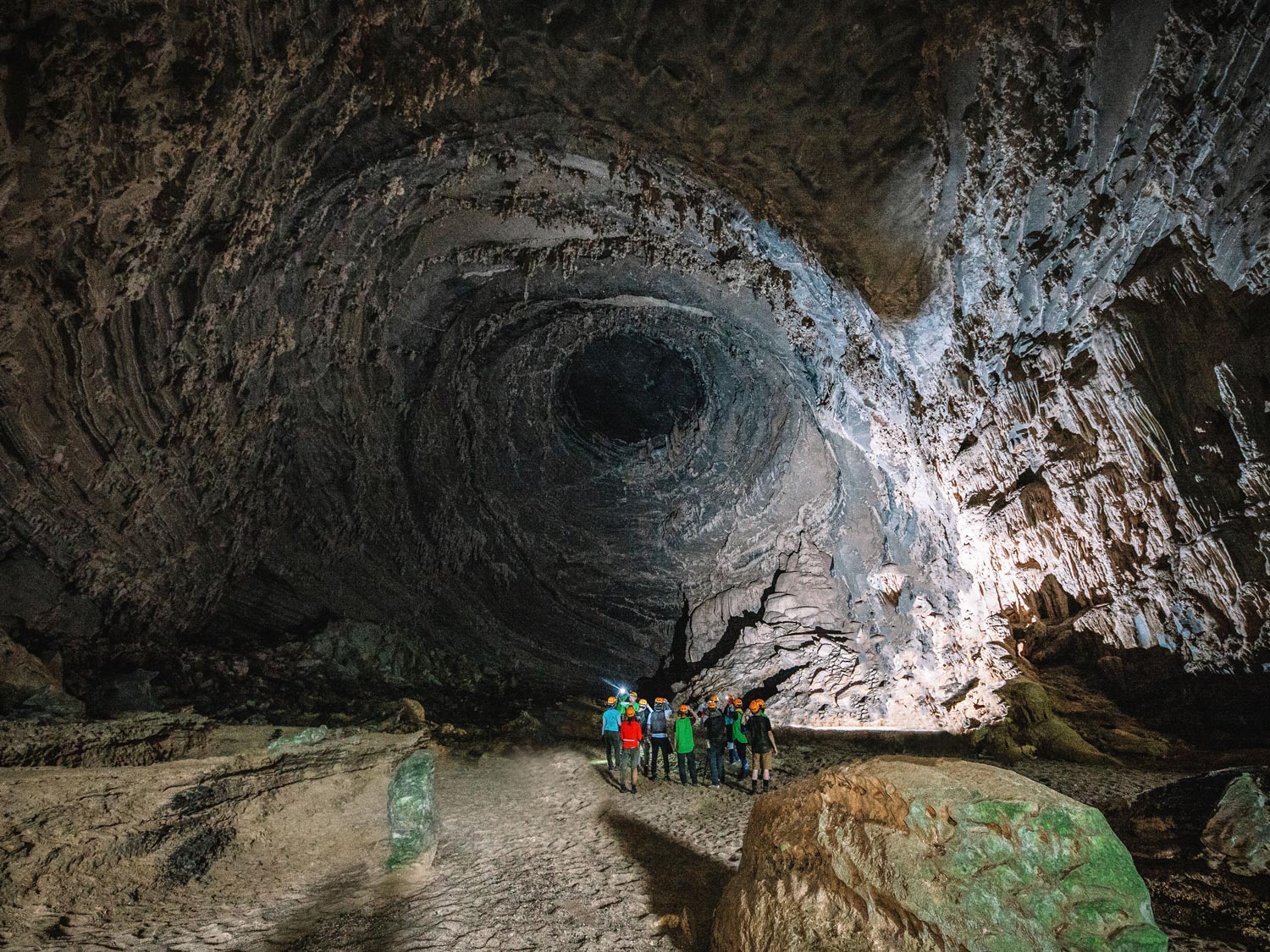 Visitors can explore Hang Tien, the largest dry cave in the region, which has an amazing and peculiar circular dome structure inside.