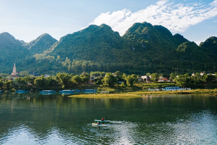 The Son River in Phong Nha is surrounded by breathtaking natural landscapes, making it the perfect spot for kayaking.