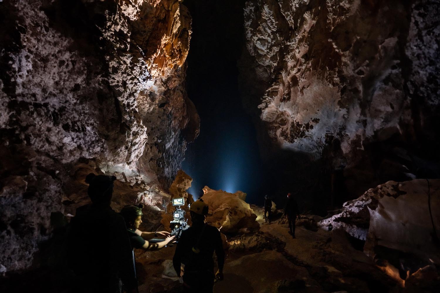 The crew captured the spectacle of water droplets falling from the cracks within the cave.