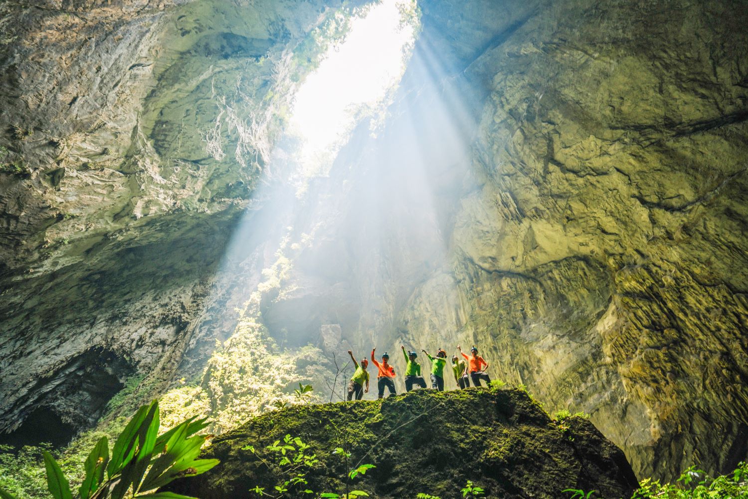 The sunbeam streams into the Doline 1 of Hang Son Doong, illuminating the cave’s vastness and beauty.