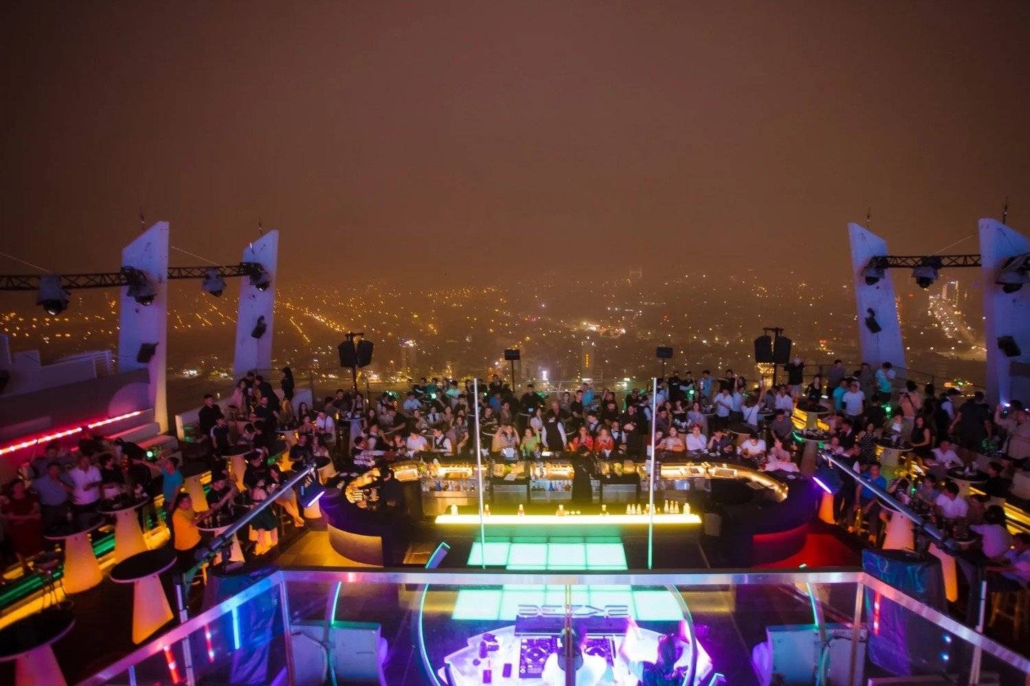 Rooftop bars in Danang serve cocktails with stunning views of the vibrant city.